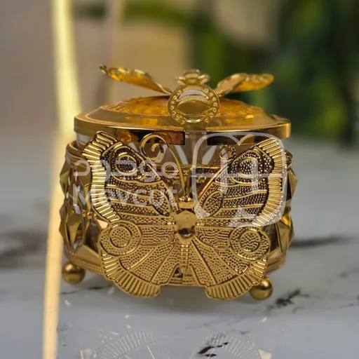 سكرية معدنية فاخرة بزخرفة الفراشة