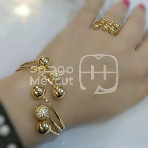 طقم المجوهرات (خاتم وإسوارة)